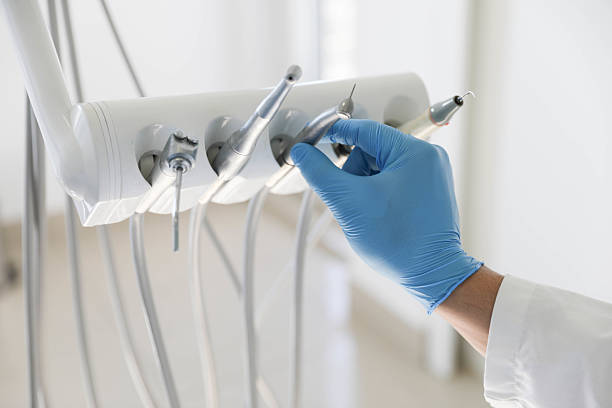 Professional Tooth Extraction technician working in Winchester city County, VA